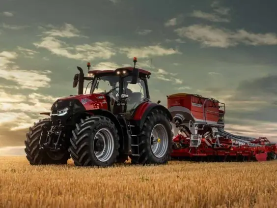 Case IH Optum 340 med såmaskin i solnedgang