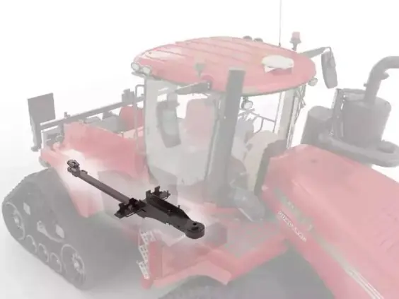 Illustrasjon av en svart komponent montert på en rød Steiger 785 Quadtrac traktor.