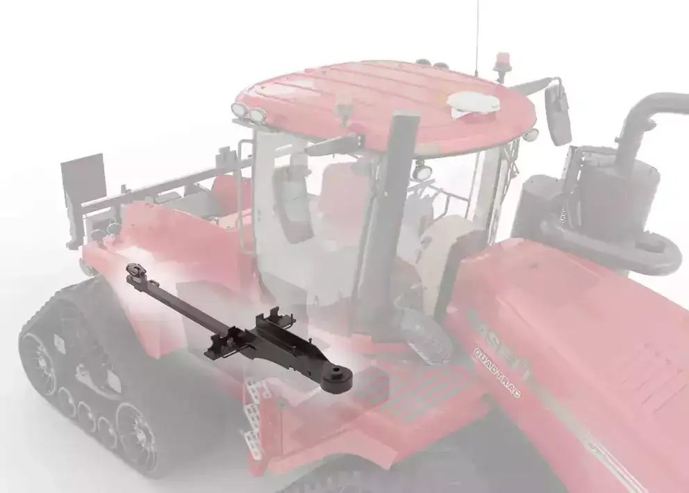 Illustrasjon av en svart komponent montert på en rød Steiger 785 Quadtrac traktor.