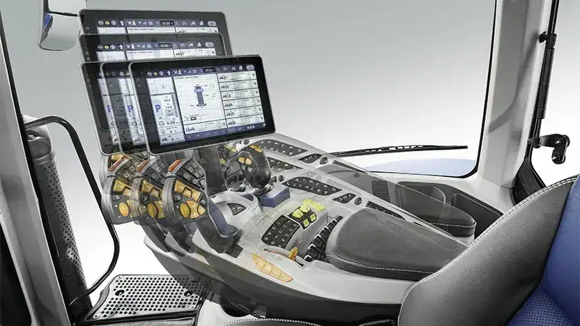 Justerbart armlene og skjerm i førerhuset på en New Holland T8 Genesis traktor.